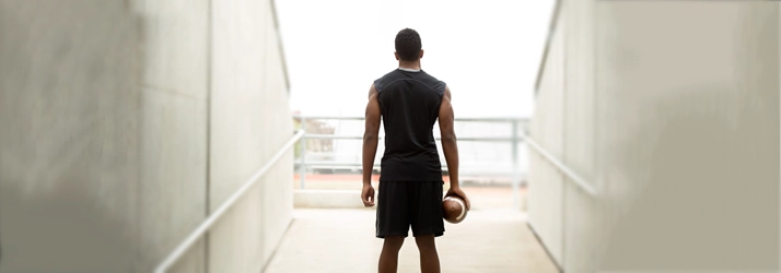 A man holding a football.