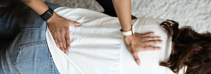 Alejandra Suarez performing a back exam.